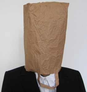 person with paper bag over their head